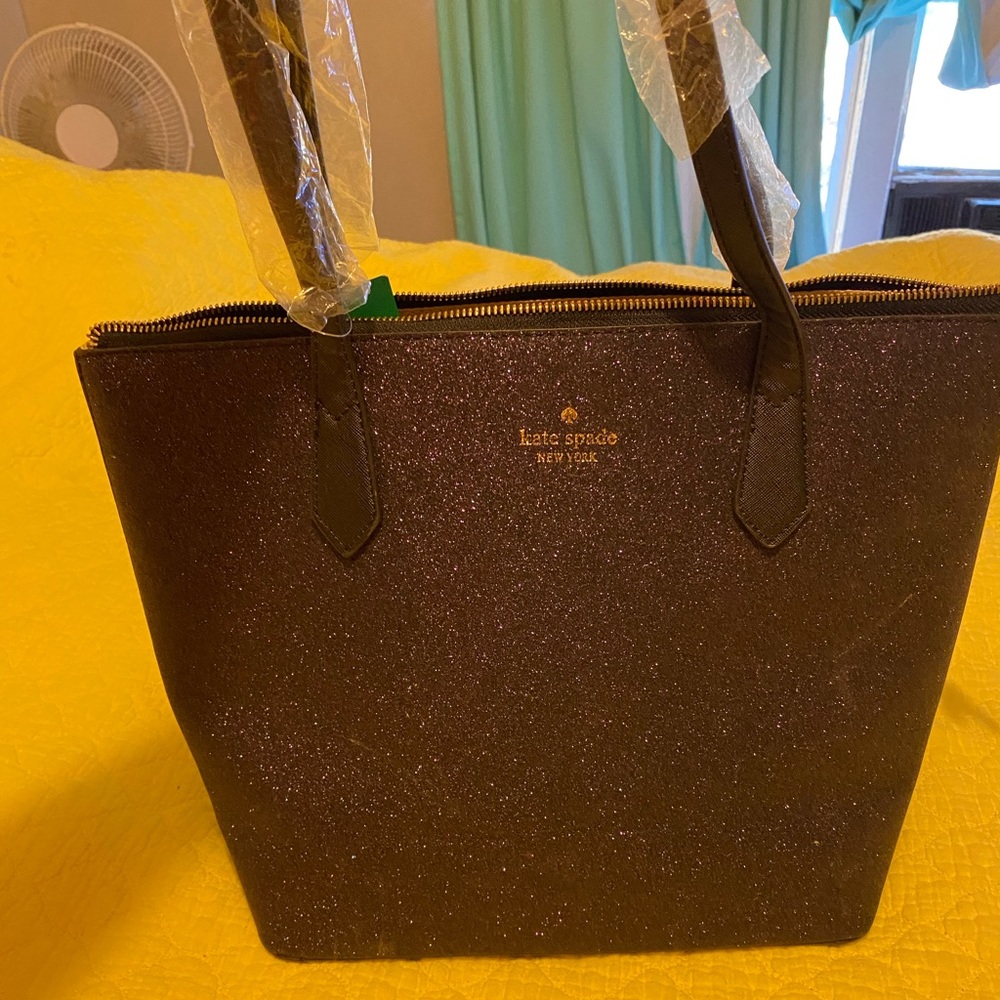 New Kate Spade purse in color purple glittery